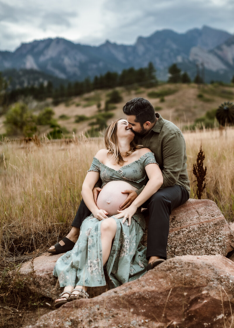 Couples Pregnancy Photoshoot in Boulder colorado in the summer at sunset