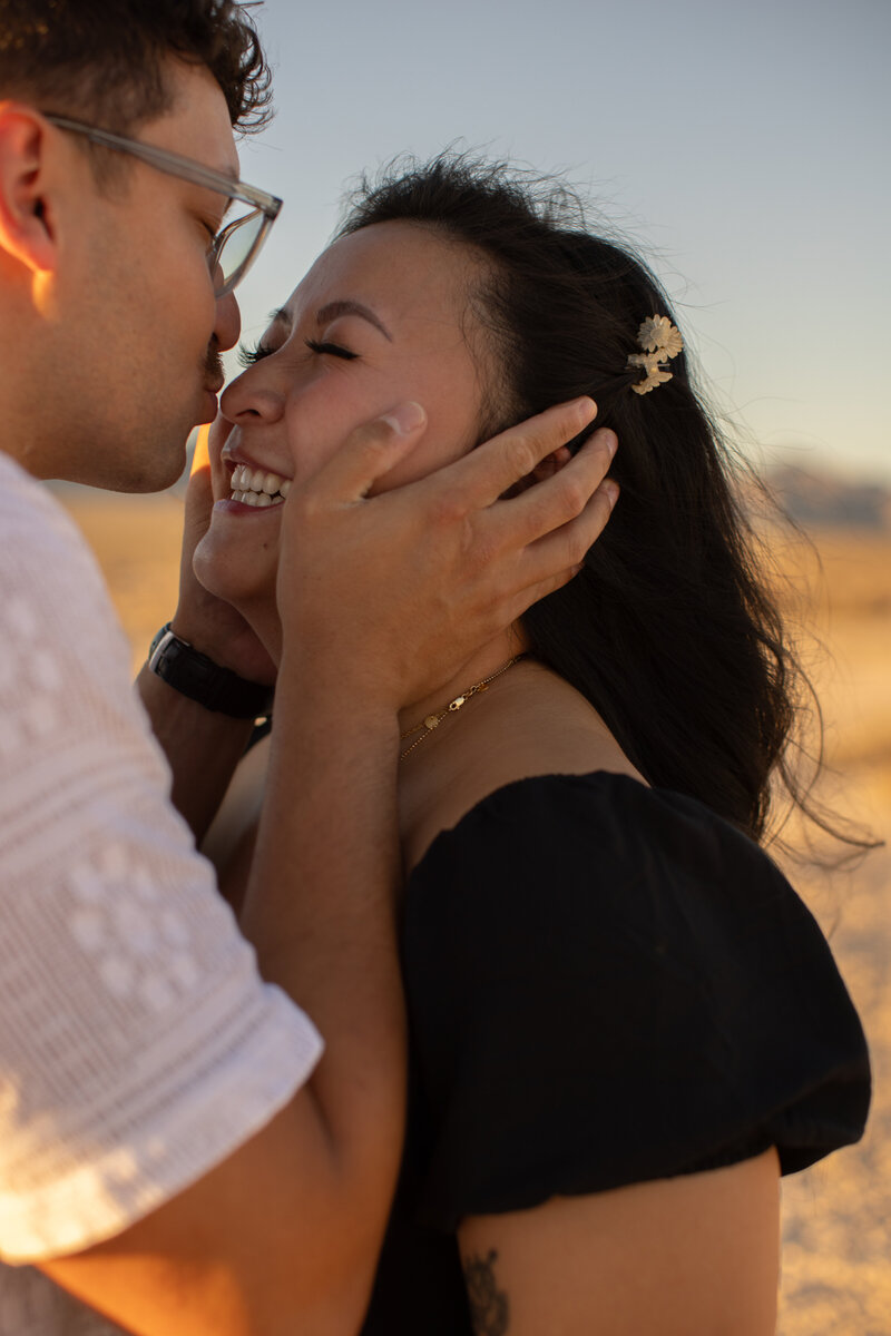 las vegas couple enjoying a joyful moment at their couple session taken by alexis dean photography