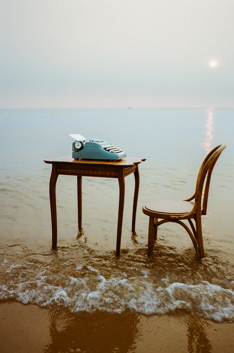 photographer sitting in chair in