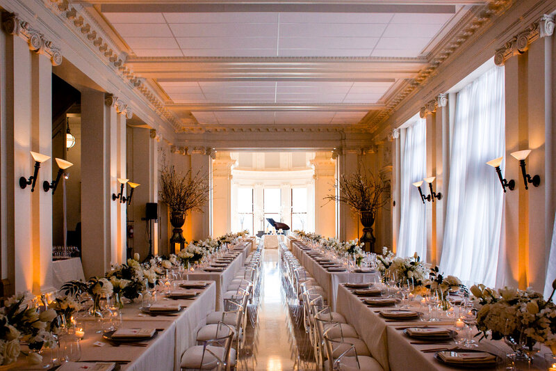 San Francisco wedding photographer captures elegant reception setup at Flood Mansion with long tables and classical architecture