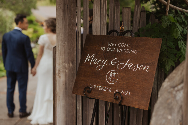 Wood welcome sign for a multicultural wedding