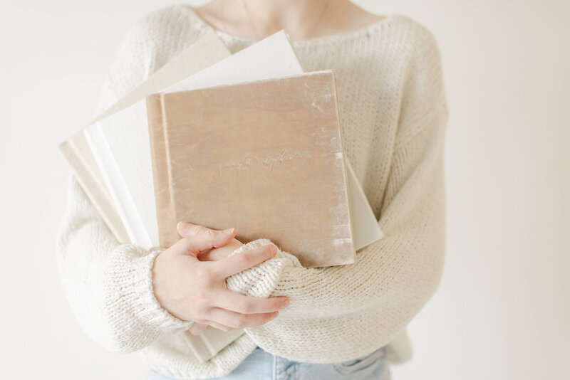 belvet heirloom album being held by woman. fresno ca, one good shot