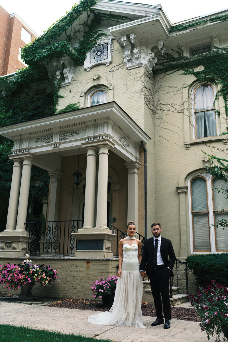 stylish-bride-groom-outside-house