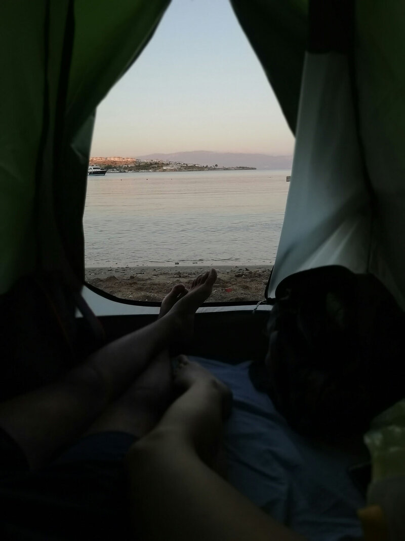 Outdoor nature view from the inside of a tent