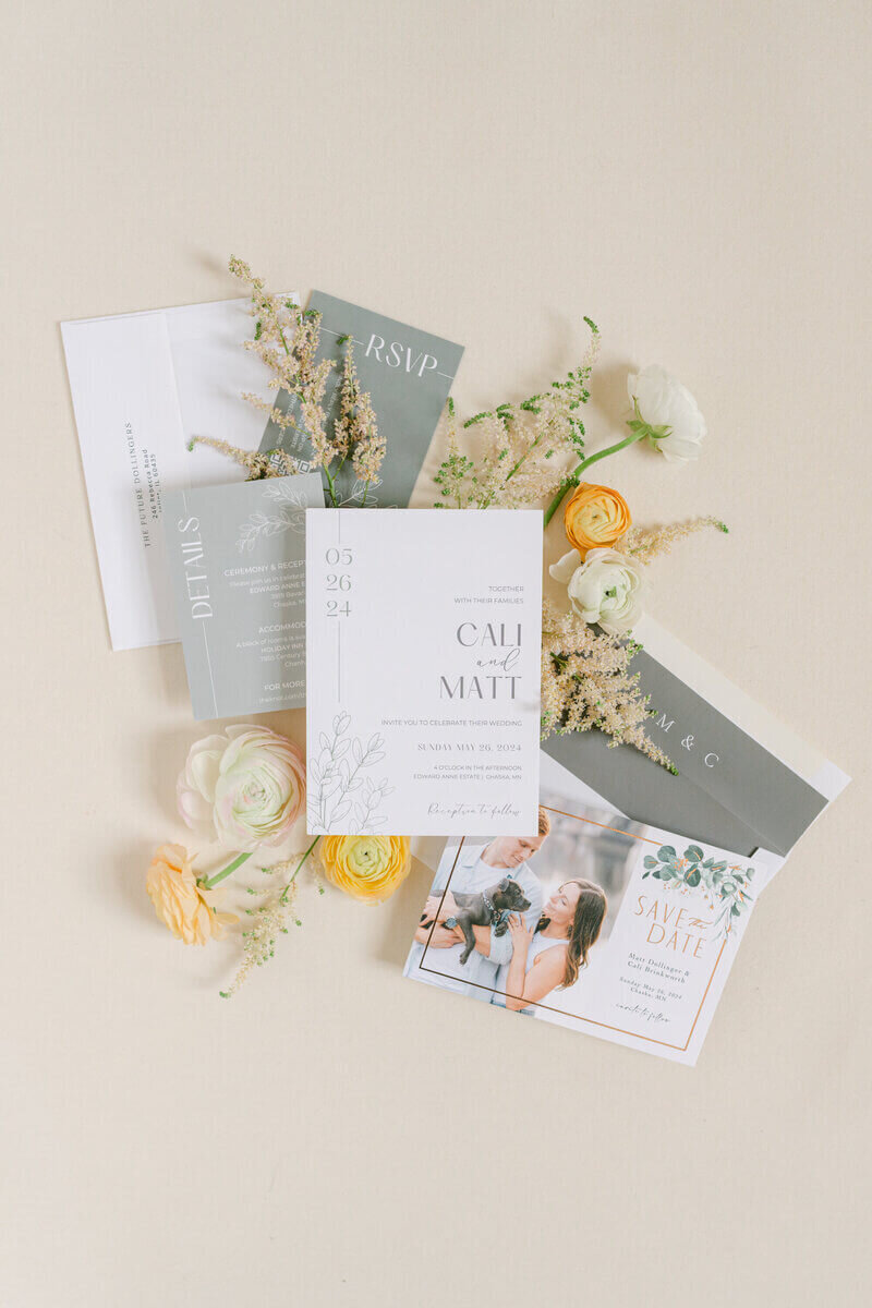 Wedding invitations styled with flowers by chicago event planners