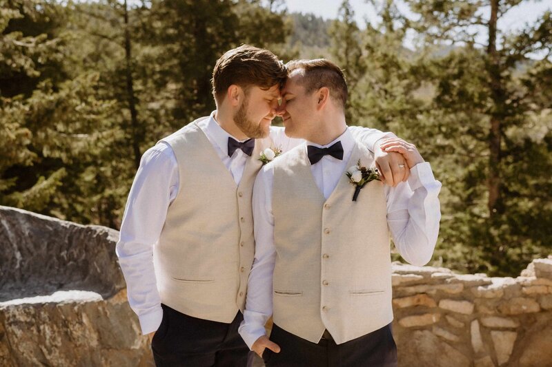 two grooms celebrating a queer wedding in Colorado