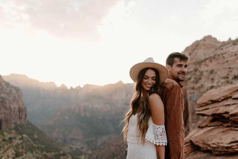 couple holding hands in the zion national park