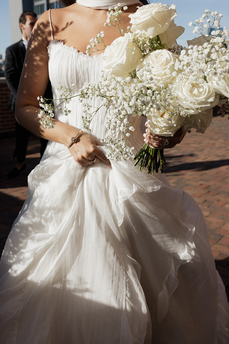 Kyla taking timeless pictures of a newly married couple