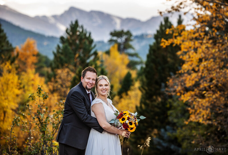 Beautiful Fall Color Wedding Portrait with Mountain Backdrop at Romantic Riversong Inn in Estes Park CO