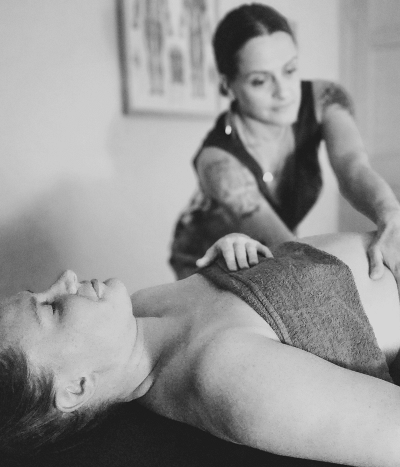 Massage therapist in Maple Grove providing relaxing bodywork session.