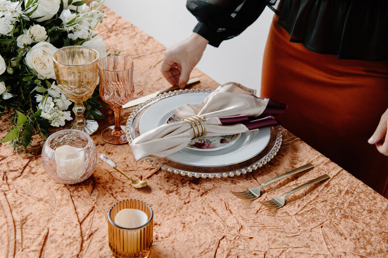 Elegant outdoor wedding setup at DC Estate Winery with beautifully arranged tables, floral centerpieces, and stylish décor, showcasing a romantic and sophisticated event ambiance.