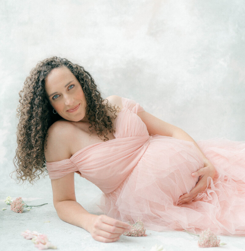 Studio maternity session with soft natural light, graceful ballerina-inspired poses, and tender moments with toddlers. PHOTOGRAPHED BY Newborn Photographer Salt Lake City