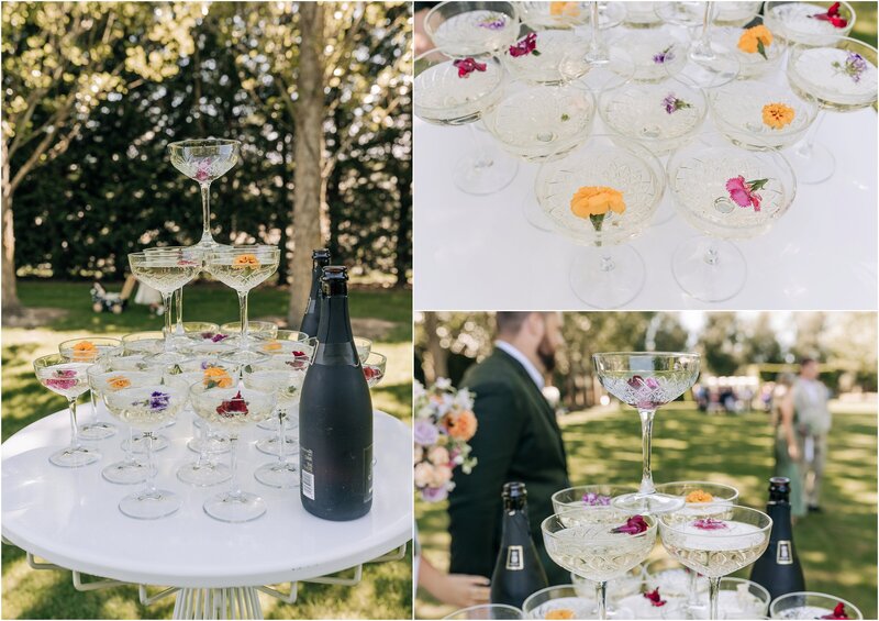 champagne tower with edible flowers on lawn after wedding ceremony