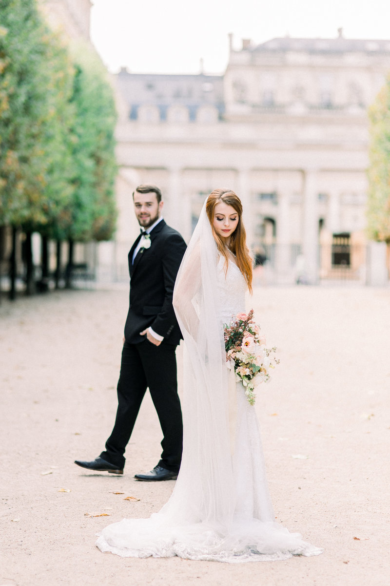 Bride and groom walk up memorial steps at their DC wedding