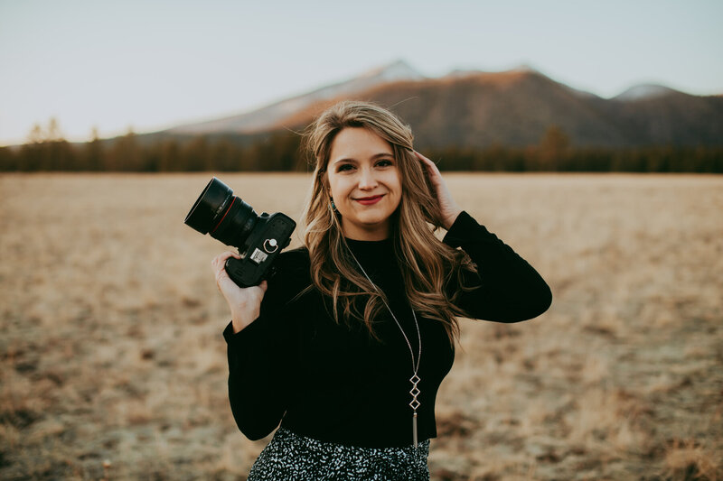 woman smiling at camera for photos in flagstaff arizona