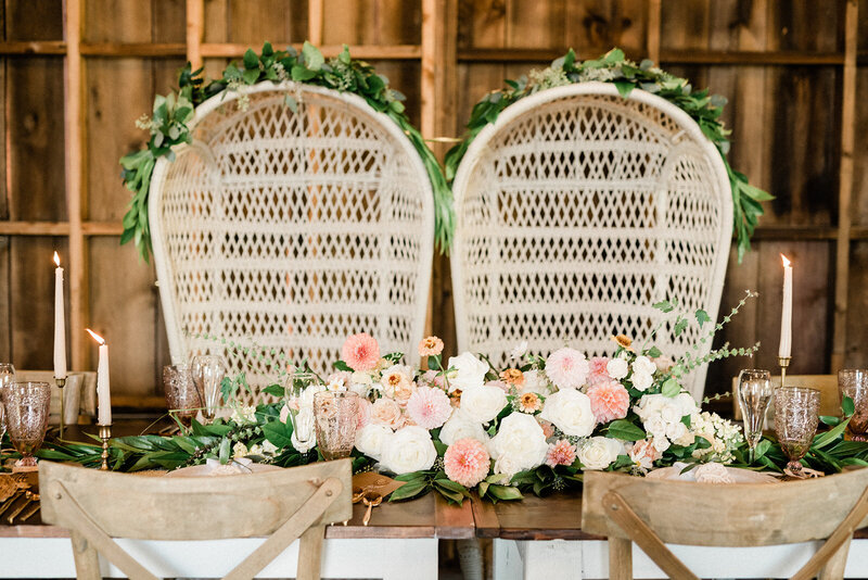 boho chic rustic wedding head table with flowers