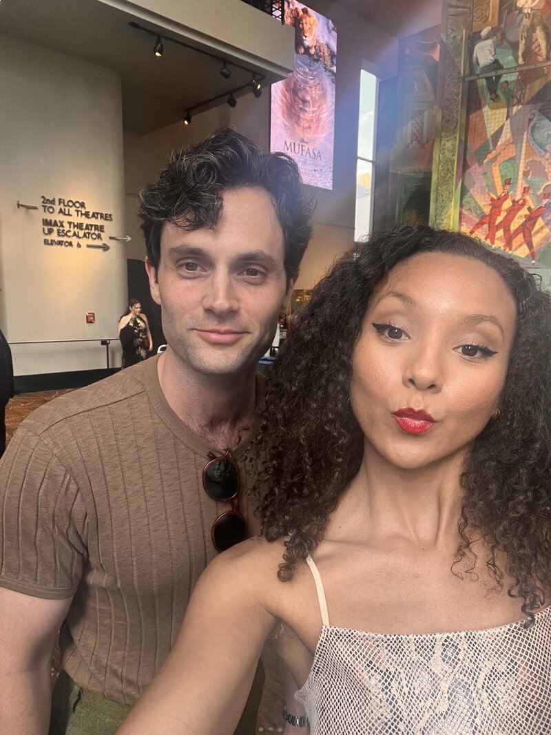 woman posing with Penn Badgley