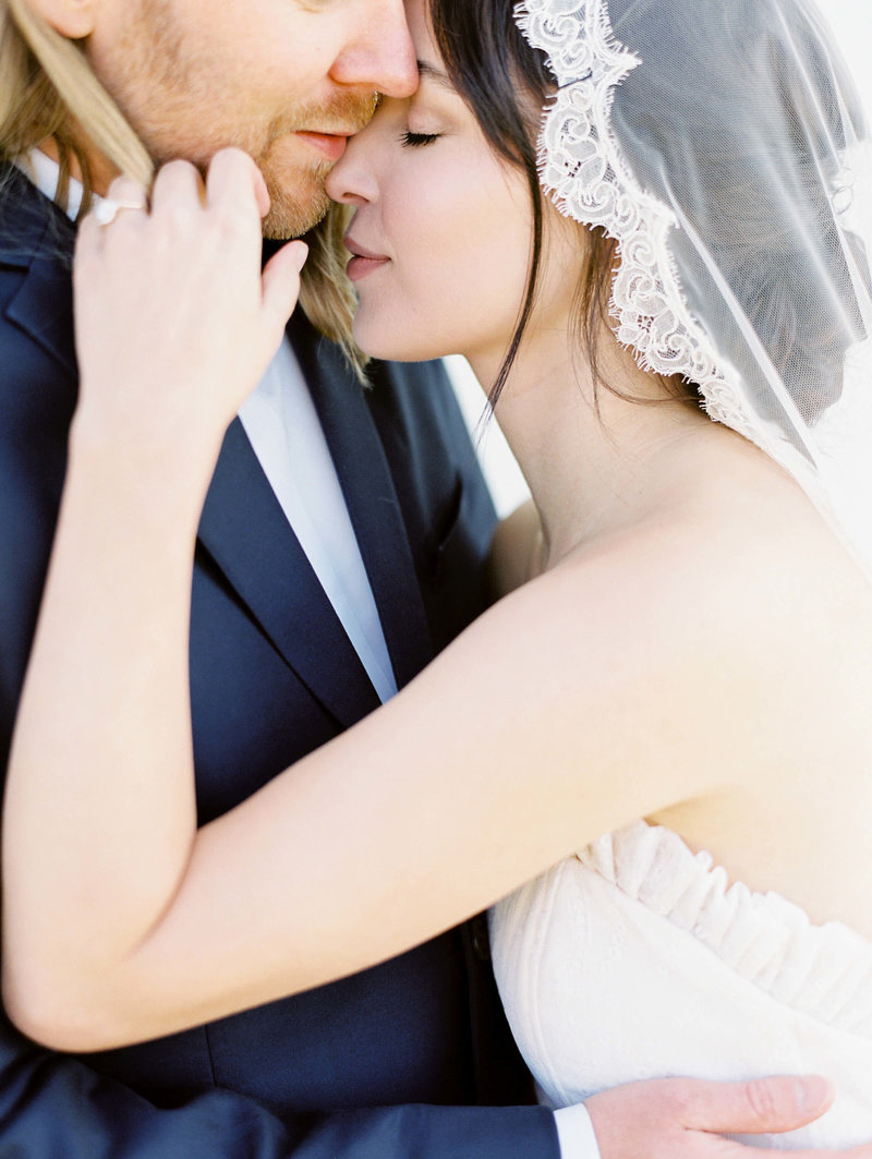 Intimate moment between bride and groom