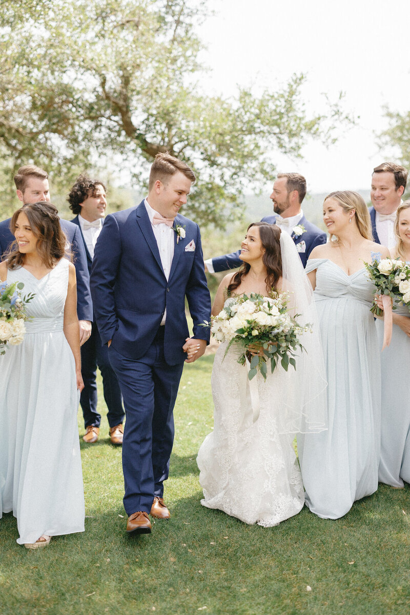 Wedding party photos beneath oak trees at Canyonwood Ridge