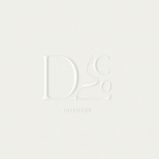 Soft embossed logo design for a stone furnishings and design studio