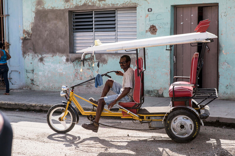 man on bike in Cuba