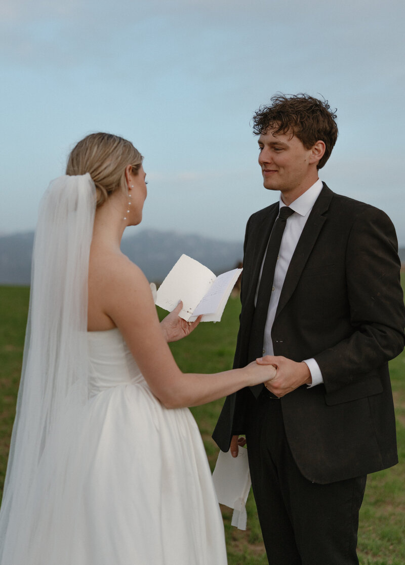Couple exchanging vows at a private horse ranch in Jackson Hole, Wyoming