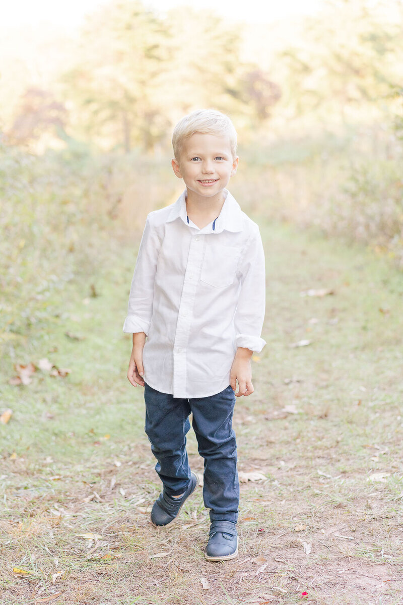 boy posing for photos during NoVa fall minis