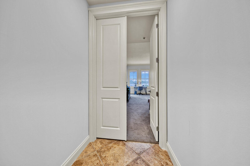 entrance with white double doors