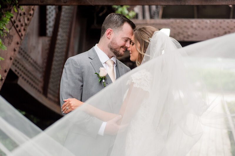 Bride and Groom embracing at Windows on the River in Cleveland Ohio