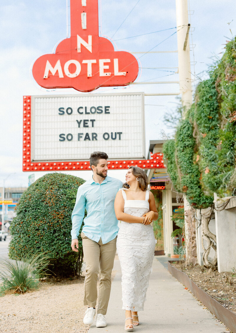 couple walks in Austin