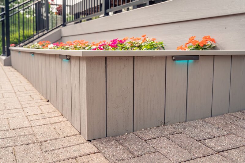 Detailed view of TimberTech Advanced PVC planter with integrated LEDs. 