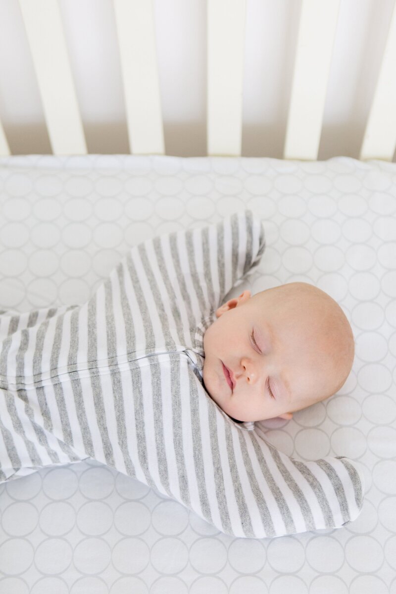 baby sleeping in safe sleep environment