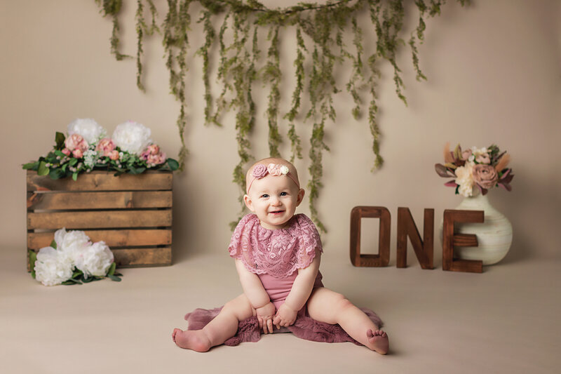 first birthday girl cake smash neutral colors and lilac