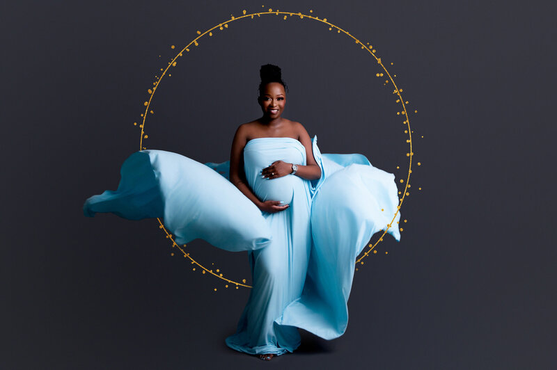 Maternity fabric flowing pose mommy dressed in blue