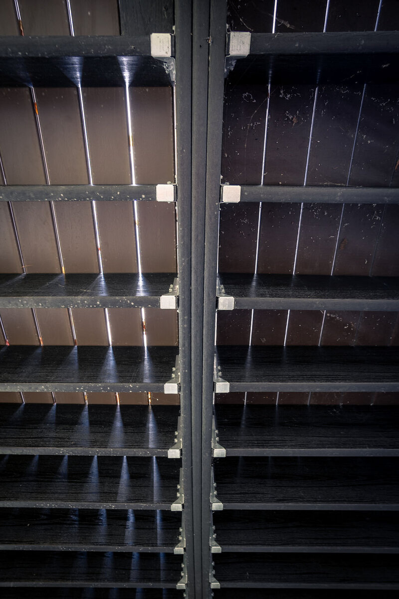 Looking up at an Owens Corning deck frame with triple beam. 