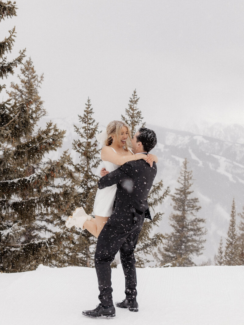 Bride and Groom on a snowy Aspen, Colorado wedding day