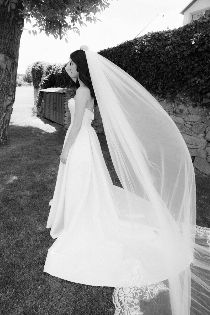 Luxury wedding in Europe – sophisticated bride in a modern wedding gown and groom in a timeless suit.