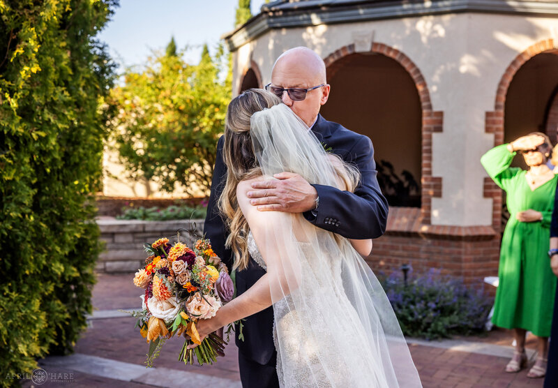 Father with his daughter on her wedding day in the Romantic Gardens at Denver Botanic Gardens