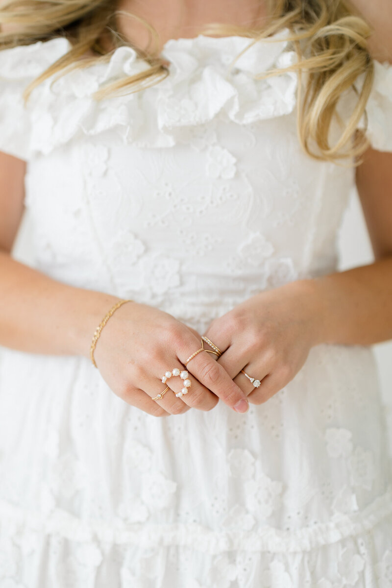 close up of rings on a hand