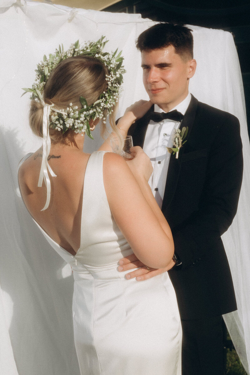 Luxury wedding in Europe – sophisticated bride in a modern wedding gown and groom in a timeless suit.