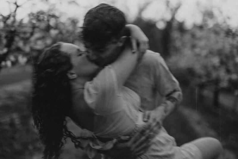 A couple hugging on a windy day at the beach