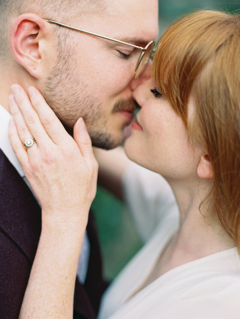 Bride and groom kissing photographed by photography business coach Arielle Peters