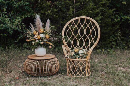 peacock chair-rattan table-flowers