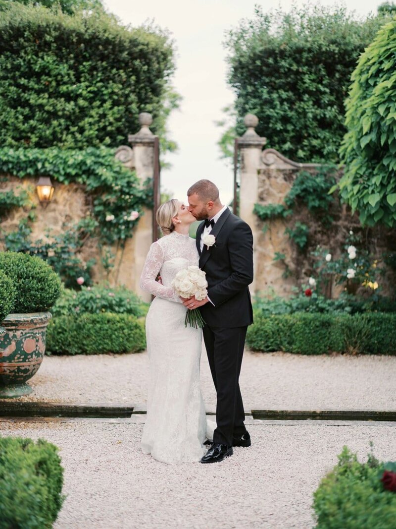 Poolside wedding couple portrait, embracing at their Grand Hotel Tremezzo Wedding, by Lake Como wedding photographer Andreas K. Georgiou