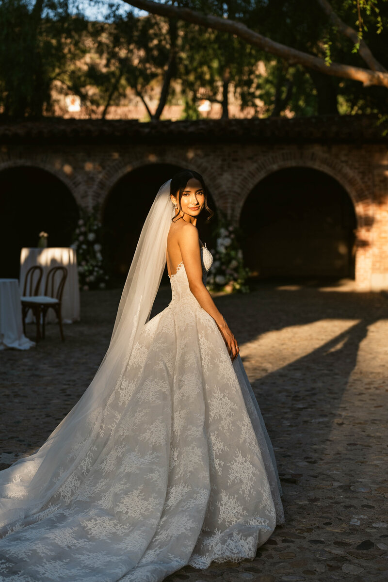 Bride in an elegant moment at a luxurious Arizona wedding venue.
