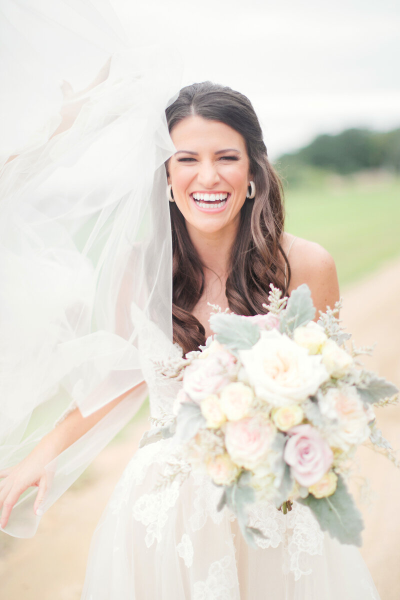 Close up of bride smiling at groom