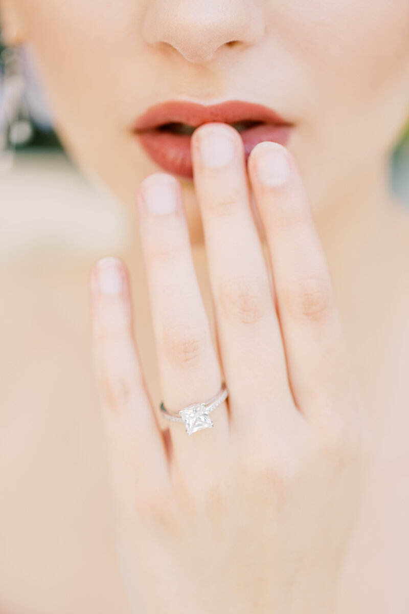 A timeless close-up of a radiant engagement ring, showcasing the artistry of fine art wedding photography.