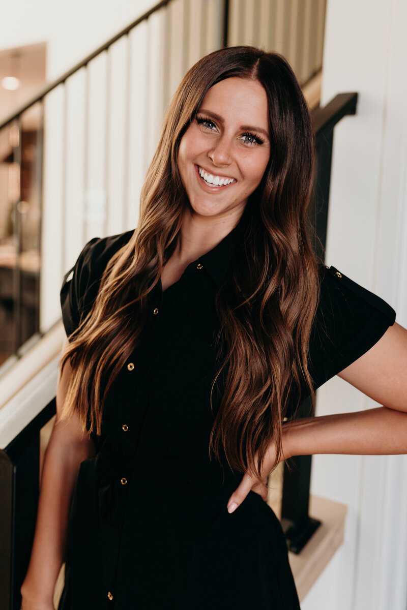 Andrea Wilde, founder and CEO of the LIVE BIG Collective smiling confidently