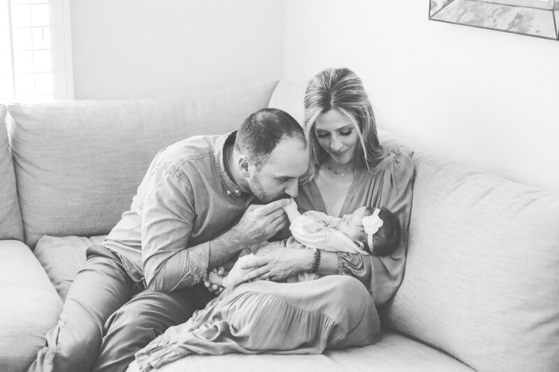 mom-dad-newborn-on-couch-florida