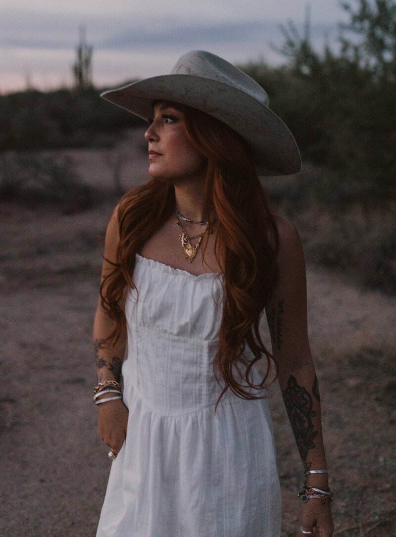 Portrait of [FoAlondra Hupe, the passionate founder and lead planner of Desert Daisy Events, committed to making every event unforgettable.